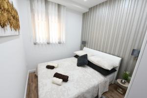 Posteľ alebo postele v izbe v ubytovaní Shine apartment Zadar