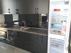 Kuchyň nebo kuchyňský kout v ubytování Lunde Sea View Apartment