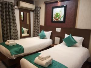 Una cama o camas en una habitación de Square Suite