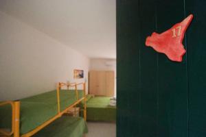 Postel nebo postele na pokoji v ubytování Residence Calavà
