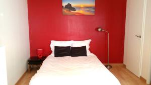 Postel nebo postele na pokoji v ubytování 1bis rue Capitaine Corhumel