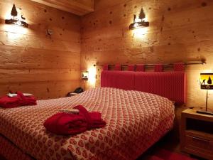 Letto o letti in una camera di Chalets Mignon