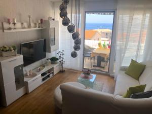 TV a/nebo společenská místnost v ubytování Apartment Mamma Mia
