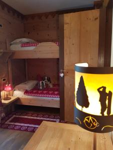 Letto o letti in una camera di Chalets Mignon