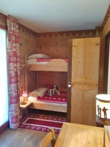 Letto o letti in una camera di Chalets Mignon