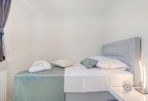 Posteľ alebo postele v izbe v ubytovaní Spacious Family Apartment MM