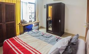 Katil atau katil-katil dalam bilik di Devmoon apartment - A Big & beautiful unit in the South of Jakarta +19 gambar