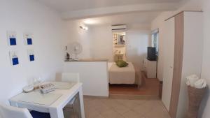 Postel nebo postele na pokoji v ubytování Studio Apartment MojMir