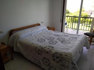 Postel nebo postele na pokoji v ubytování Apartamento fontiñas Sanxenxo montalvo