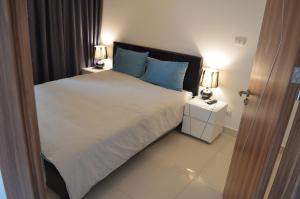 Katil atau katil-katil dalam bilik di Maldives Laguna Beach Resort 3