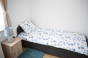 Postel nebo postele na pokoji v ubytování Megan