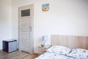 Postel nebo postele na pokoji v ubytování Megan