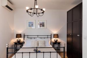 Ein Bett oder Betten in einem Zimmer der Unterkunft Ortenca Apartment