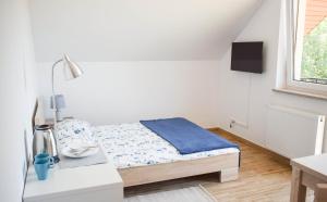 Postel nebo postele na pokoji v ubytování Megan