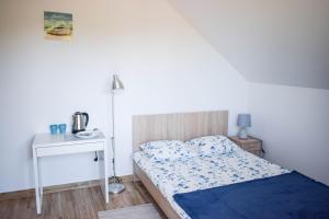 Postel nebo postele na pokoji v ubytování Megan