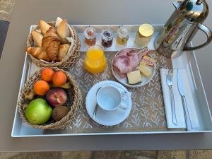 Možnosti snídaně pro hosty v ubytování Hôtel O’Banel