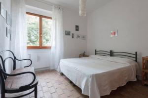 A bed or beds in a room at B&B Al Cavalluccio Marino
