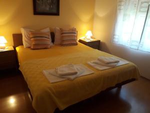 Postel nebo postele na pokoji v ubytování Apartments Jadranka Povile