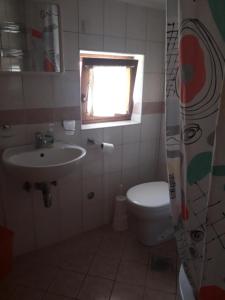 Koupelna v ubytování Apartments Jadranka Povile