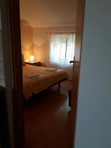 Postel nebo postele na pokoji v ubytování Apartments Jadranka Povile