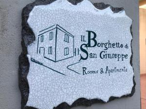 a drawing of a building on a paper at Il Borghetto di San Giuseppe EtnaRooms&Apartments in Nicolosi