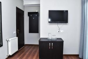 TV a/nebo společenská místnost v ubytování Gelati Tower
