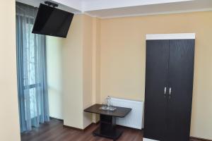 TV a/nebo společenská místnost v ubytování Gelati Tower