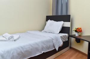 Postel nebo postele na pokoji v ubytování Gelati Tower
