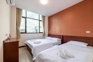 Scala Hostel tesisinde bir odada yatak veya yataklar