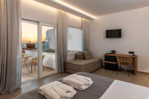 Cama ou camas em um quarto em Avra Mykonos