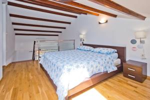 Posteľ alebo postele v izbe v ubytovaní Luxury Bellavista Amazing sea Holidays with Private Beach & Parking