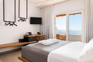 Cama ou camas em um quarto em Avra Mykonos