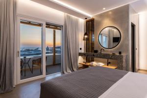 Cama ou camas em um quarto em Avra Mykonos