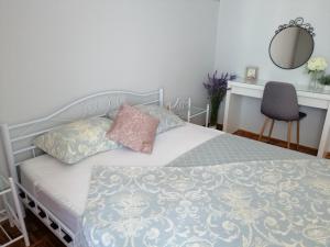 Postel nebo postele na pokoji v ubytování Apartmani Mataija