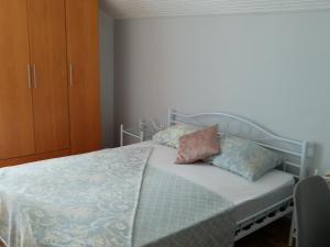 Postel nebo postele na pokoji v ubytování Apartmani Mataija