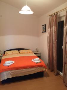Postel nebo postele na pokoji v ubytování Apartments Anka