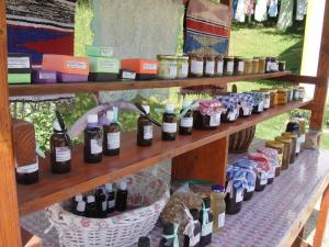 a display of bottles of wine on shelves at Home-Vasva and Hazim in Ćukovi +37 photos