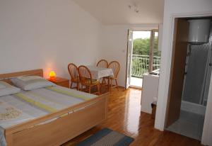 Postel nebo postele na pokoji v ubytování Apartment Coskovic