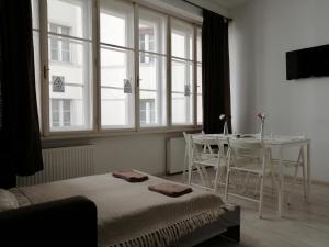 Televízia a/alebo spoločenská miestnosť v ubytovaní Zoom-Budapest Apartments
