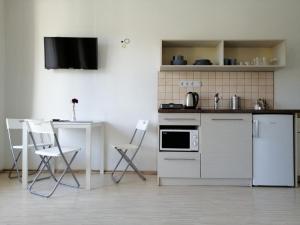Kuchyňa alebo kuchynka v ubytovaní Zoom-Budapest Apartments