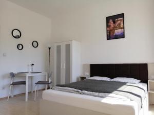 Posteľ alebo postele v izbe v ubytovaní Zoom-Budapest Apartments