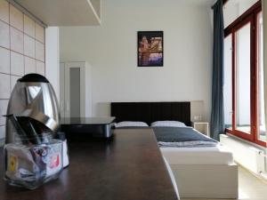 Posteľ alebo postele v izbe v ubytovaní Zoom-Budapest Apartments