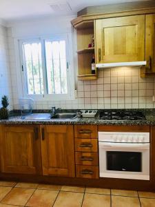 Kuchnia lub aneks kuchenny w obiekcie Casa de familia