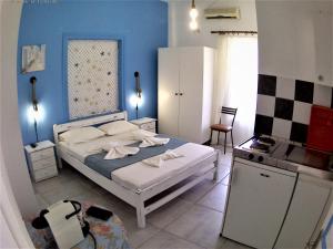 Postel nebo postele na pokoji v ubytování Apanemia Rooms + 37 fotografií