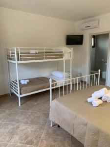 Postel nebo postele na pokoji v ubytování Le tre colonne