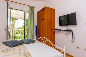 Posteľ alebo postele v izbe v ubytovaní Apartments Berislav
