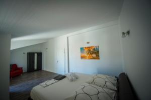 Ένα ή περισσότερα κρεβάτια σε δωμάτιο στο Apartments Nena
