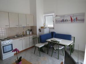 Kuchyň nebo kuchyňský kout v ubytování Apartment MARKO + 11 fotografií