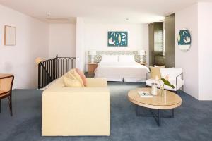 Postel nebo postele na pokoji v ubytování Hotel Ravesis