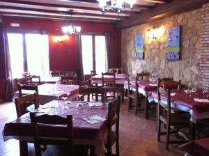 مطعم أو مكان آخر لتناول الطعام في Posada el Mirador